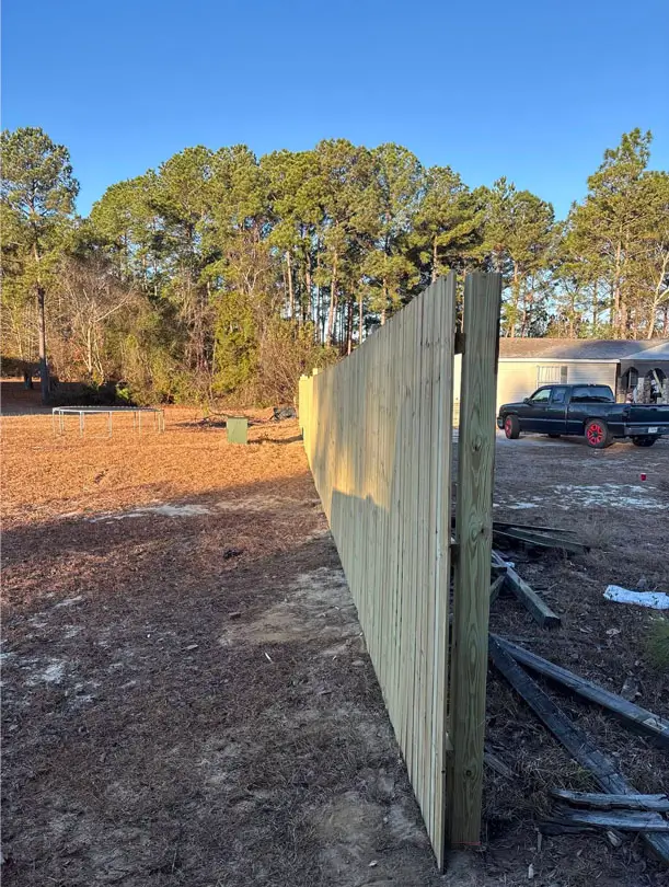 Newly installed residential wooden fence.